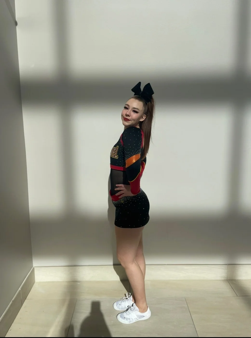Coach Sofia, junior gymnastics and Recreational Cheer coach and competitive cheer athlete at Next Level Athletics