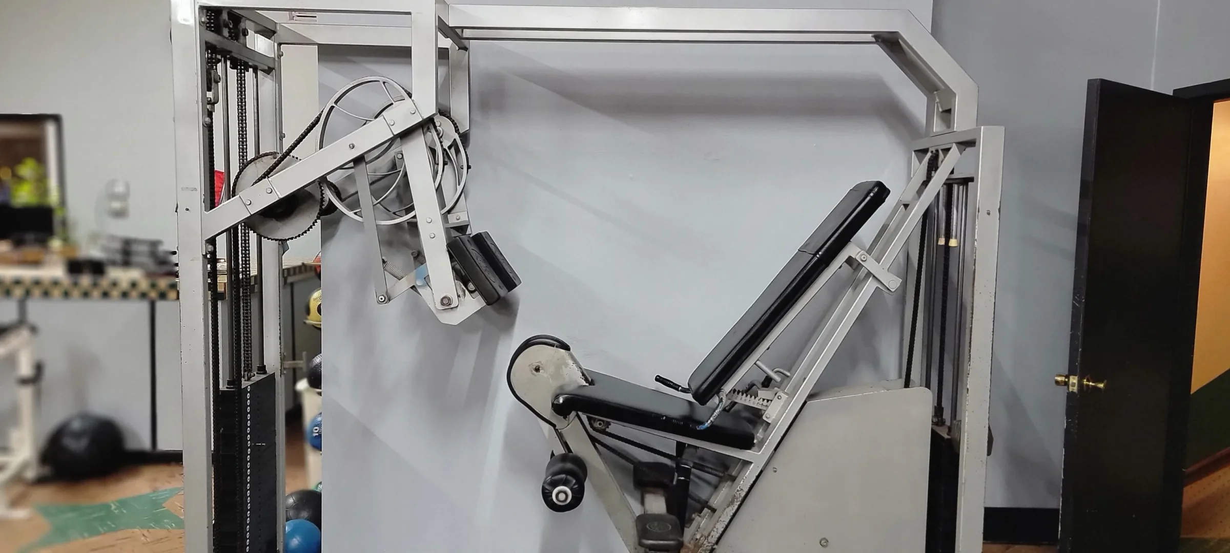 Selectorized and cable equipment at Next Level Fitness Moline