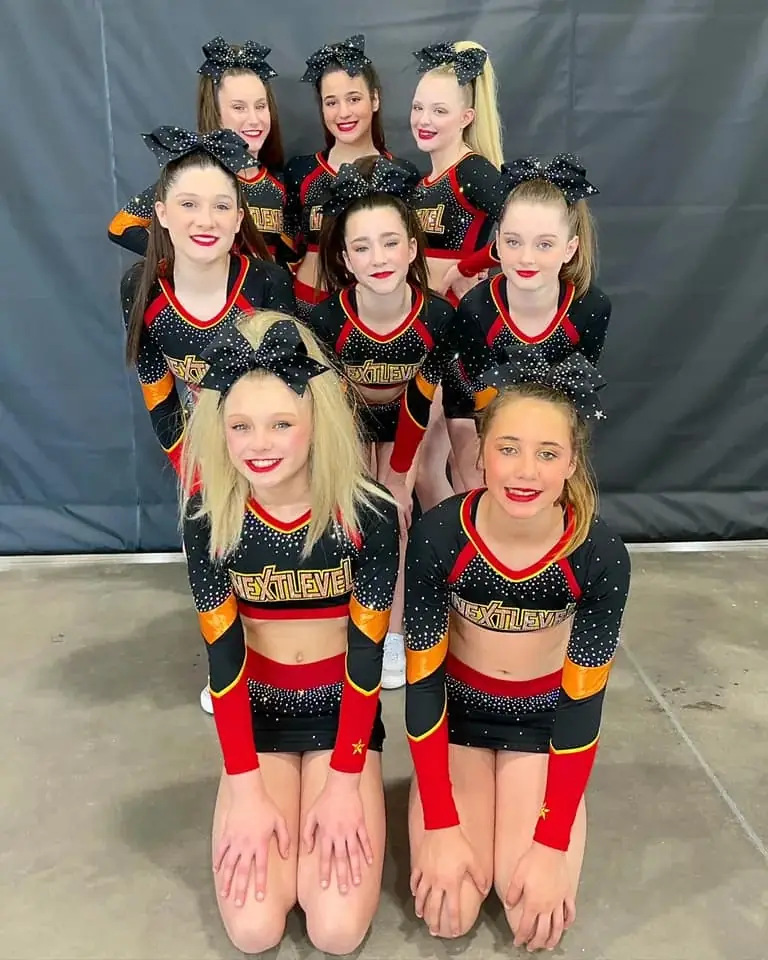 All-Star cheer team practicing stunts at Next Level Athletics in Moline, Illinois